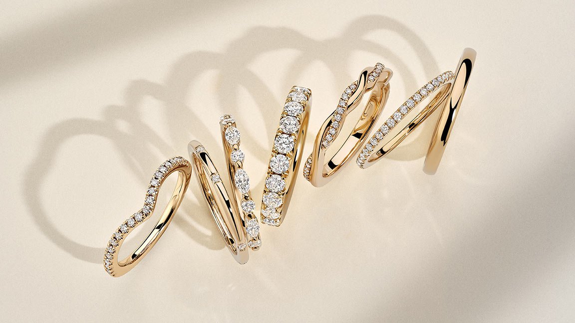 A selection of gold rings with diamond details